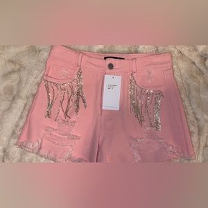 the cutest pink shorts with rhinestones!